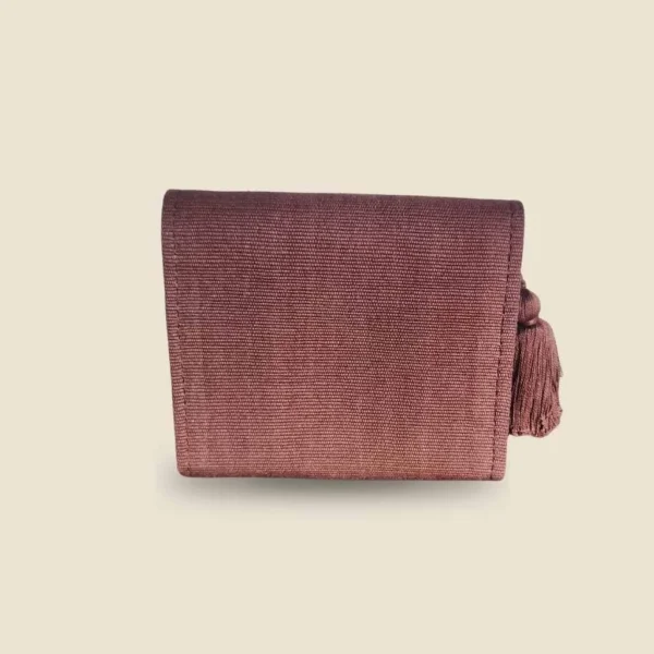 Cartera atras telar