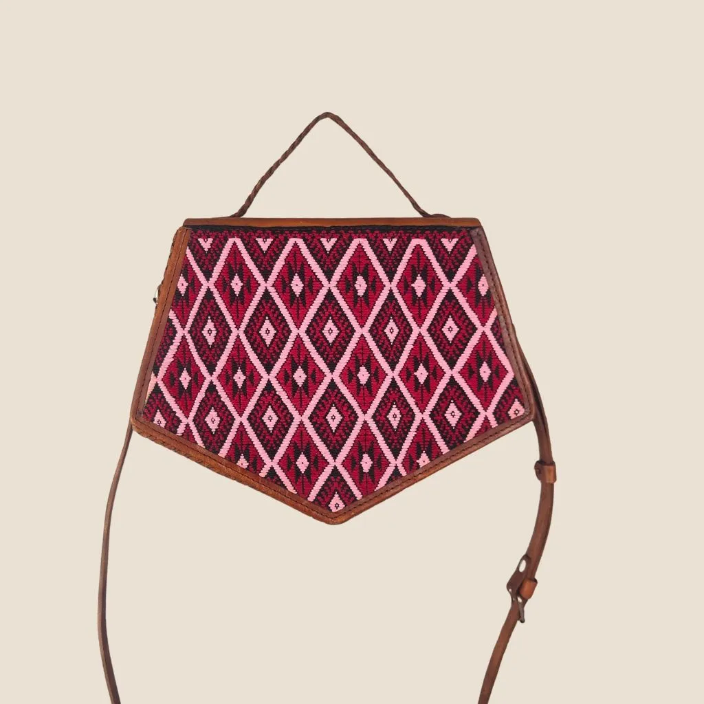 bolsa de piel tonos rosas