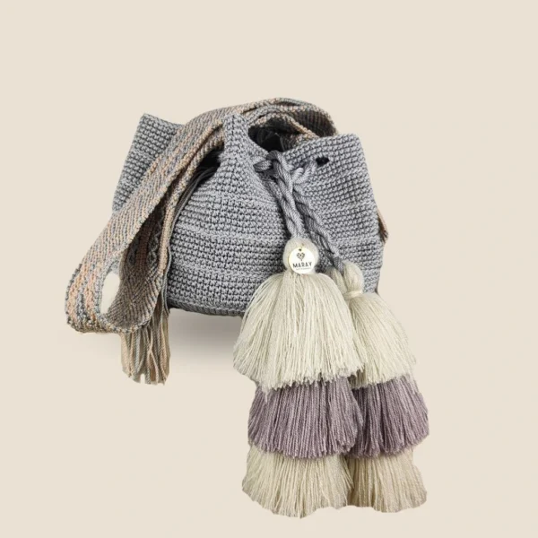 bolsa pompones perla